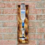 Wall mounted bar pour system designed for organized serving and consistent shot dispensing.