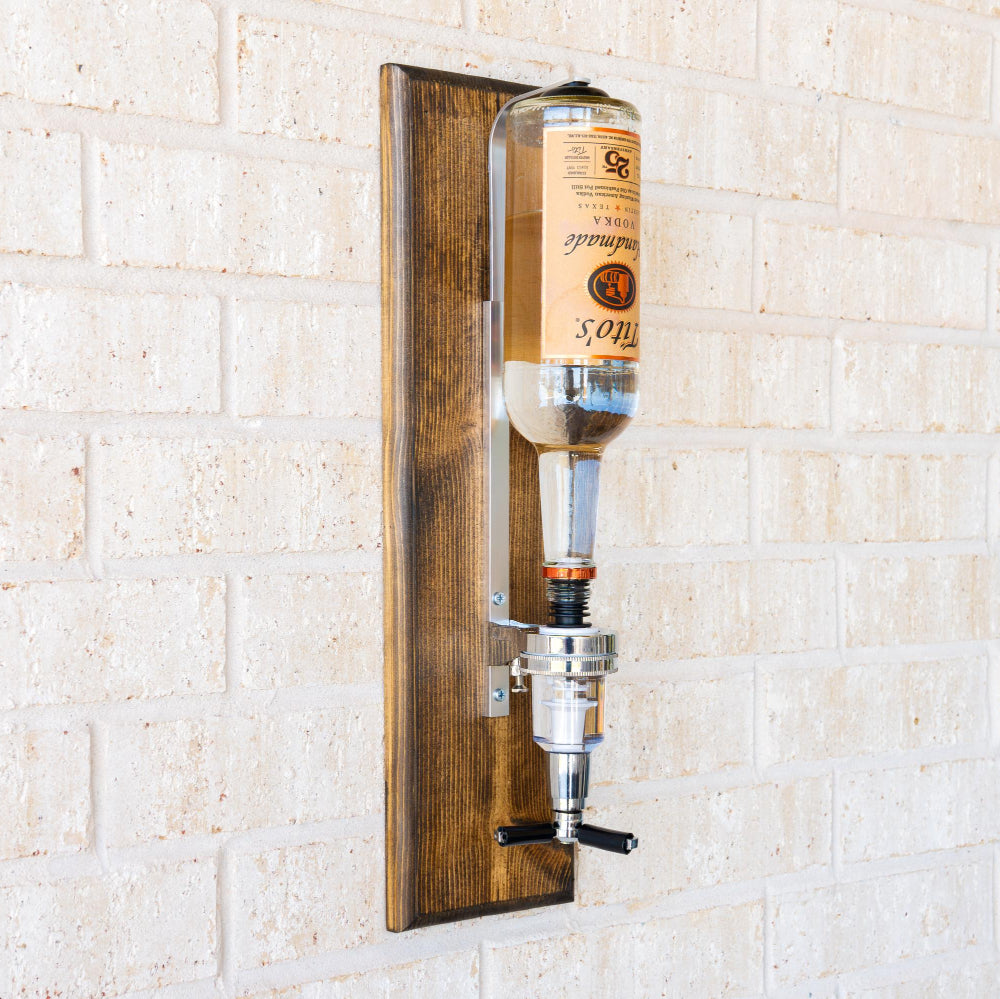 White oak liquor dispenser handcrafted for durable and stylish wall mounted bar storage.